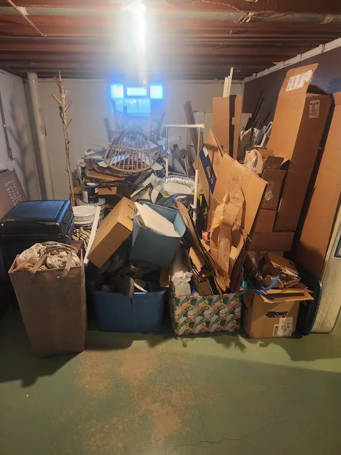 Roll-off dumpster container at job site for 2 Yard Dumpster Rental in Skowhegan